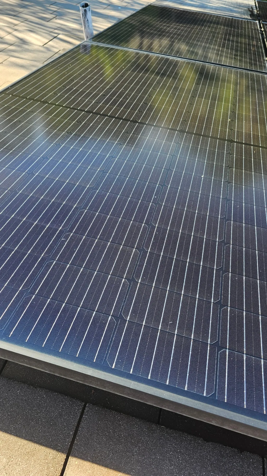 Close-up of a clean solar panel surface after professional cleaning