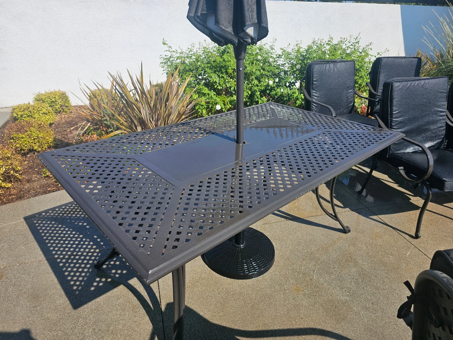 Clean patio table after a Transparent Solutions soft washing service